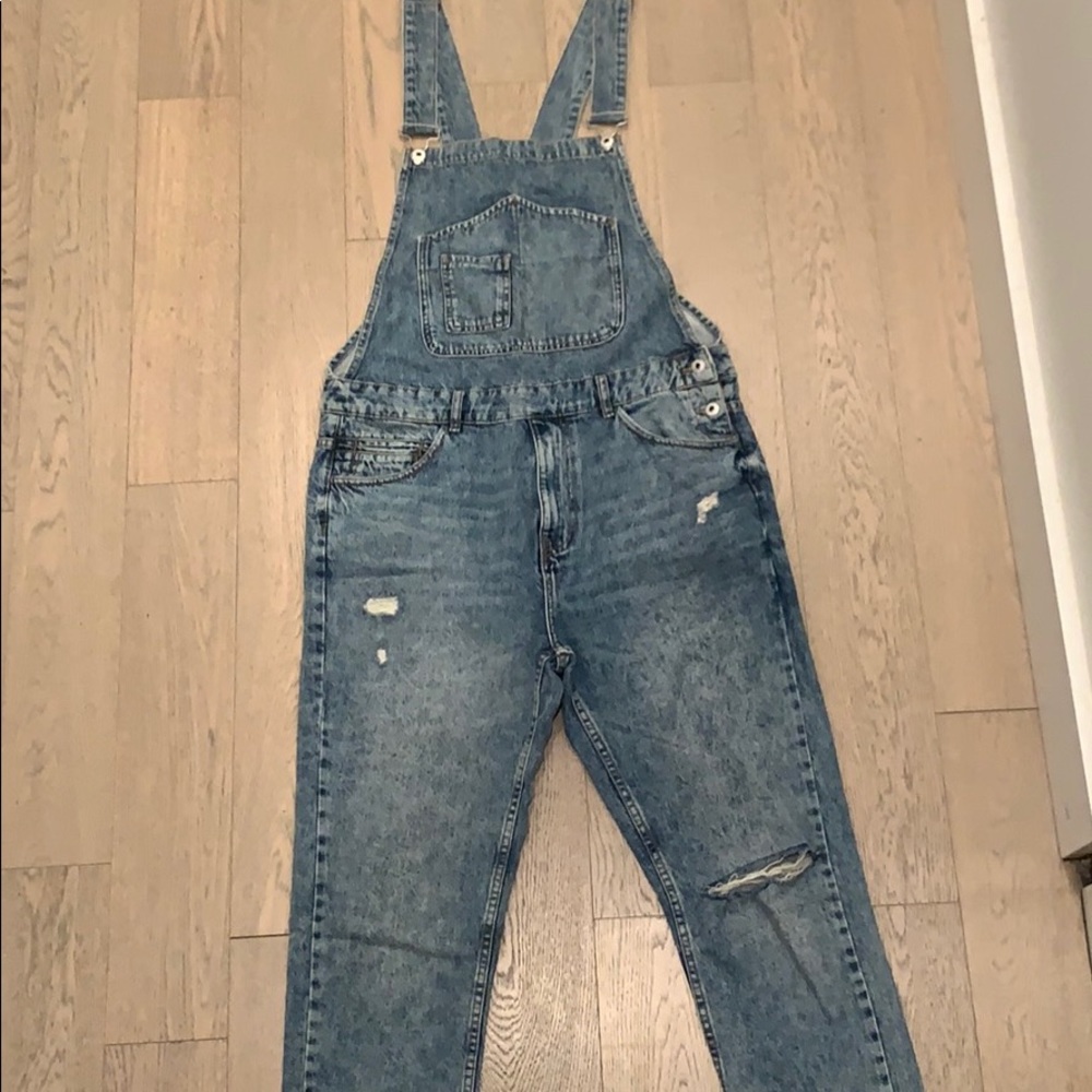 A men’s Blue jean overall jumpsuit from Zara.